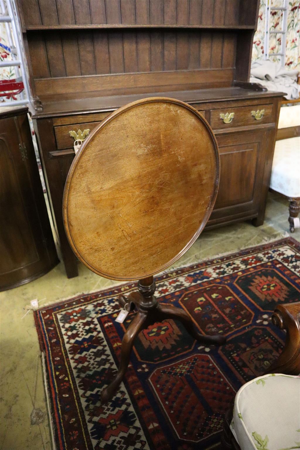 A Georgian and later circular mahogany tilt-top table, 53cm diameter, height 68cm